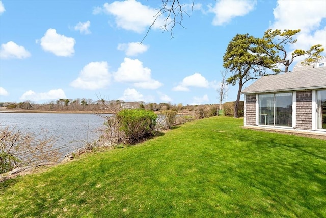 view of yard with a water view