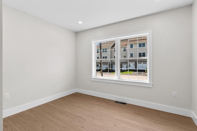 35 Columbia Ave, Lynn, MA 01902 - empty room featuring baseboards, wood finished floors, and recessed lighting