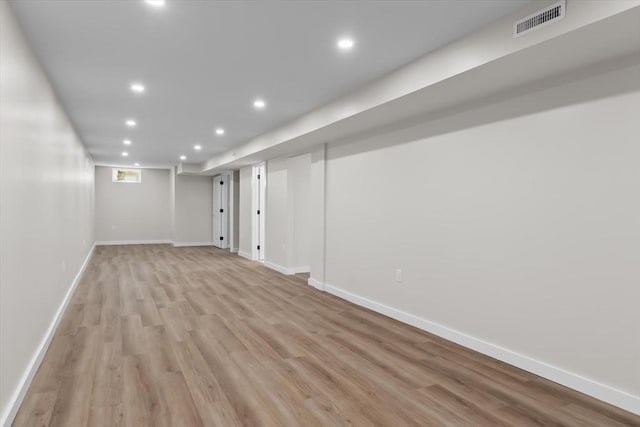 35 Columbia Ave, Lynn, MA 01902 - finished below grade area with light wood-style floors, recessed lighting, and baseboards