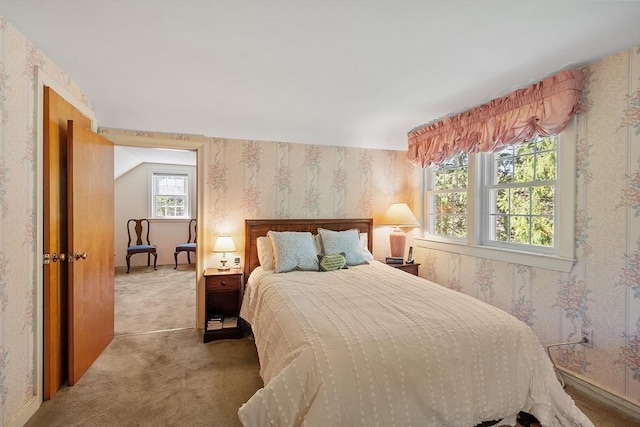 carpeted bedroom featuring wallpapered walls