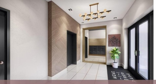 301 Border Unit U606, Boston, MA 02128 - hall featuring tile patterned floors, mail area, and baseboards