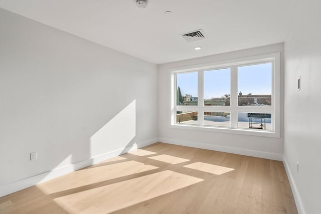 301 Border Unit U606, Boston, MA 02128 - spare room featuring baseboards, light wood-style flooring, and recessed lighting