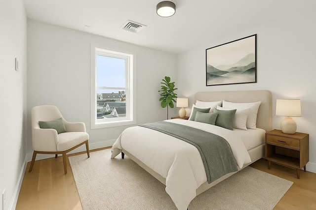 301 Border Unit U606, Boston, MA 02128 - bedroom featuring light wood-type flooring and baseboards