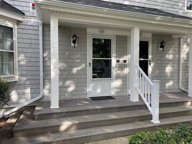 doorway to property with a porch