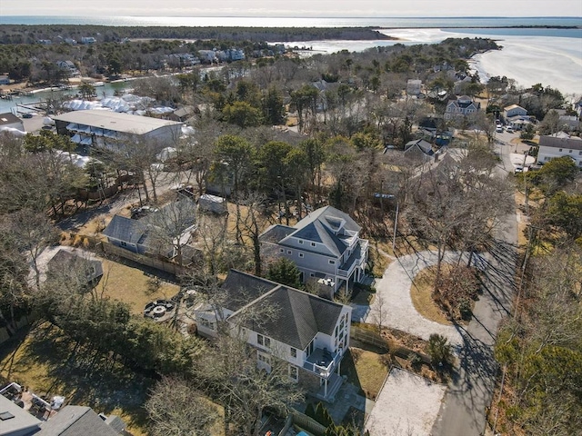 birds eye view of property featuring a residential view and a water view