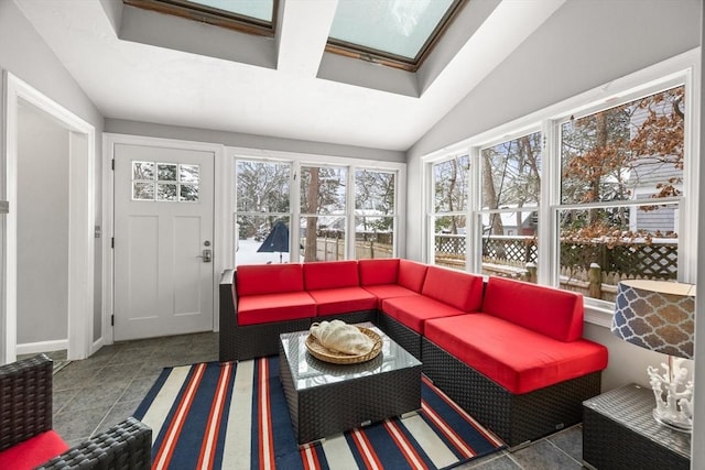 sunroom with lofted ceiling with skylight