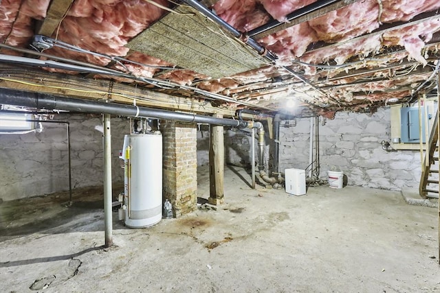 basement with electric panel and gas water heater