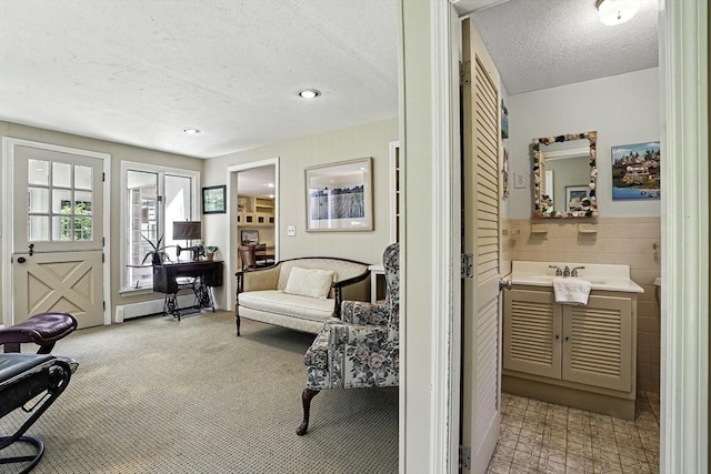37 Eastview Rd, Hopkinton, MA 01748 - sitting room with a textured ceiling, light colored carpet, and recessed lighting