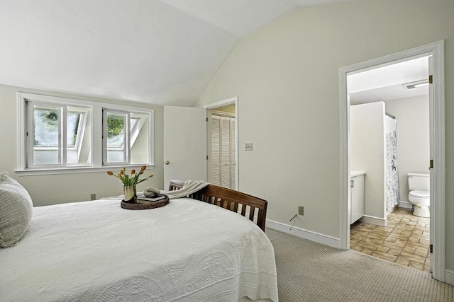 37 Eastview Rd, Hopkinton, MA 01748 - bedroom with lofted ceiling, baseboards, and ensuite bath