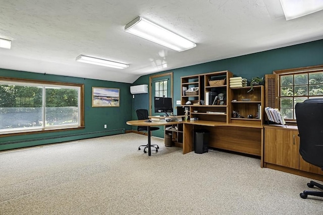 37 Eastview Rd, Hopkinton, MA 01748 - office area with a wall mounted air conditioner, lofted ceiling, baseboard heating, carpet, and baseboards