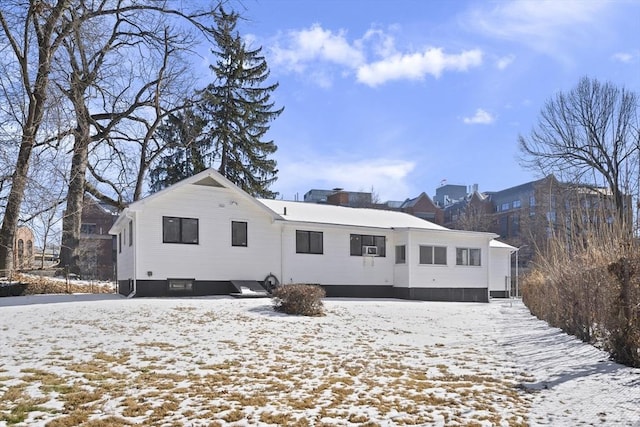 view of snow covered house