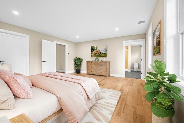 bedroom with recessed lighting, baseboards, visible vents, and light wood-style flooring