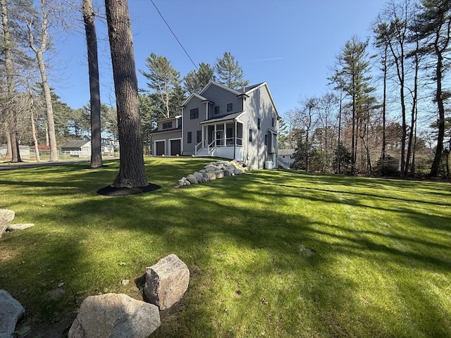 view of yard with a sunroom