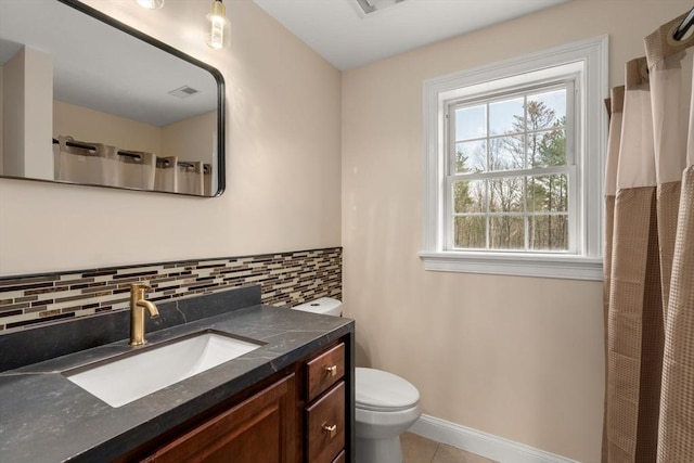 2 Britlees Way, Dudley, MA 01571 - full bathroom featuring vanity, curtained shower, tile patterned flooring, and decorative backsplash
