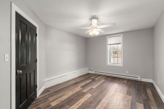 2 Britlees Way, Dudley, MA 01571 - empty room with a baseboard heating unit, wood finished floors, and ceiling fan