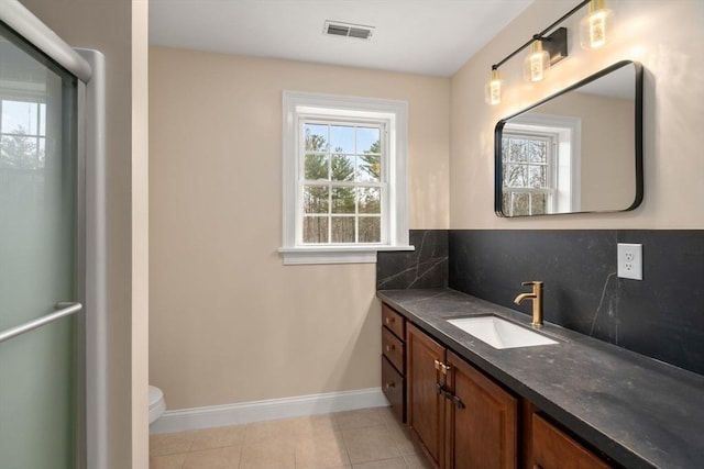 2 Britlees Way, Dudley, MA 01571 - bathroom with vanity, backsplash, tile patterned flooring, and a shower with shower door