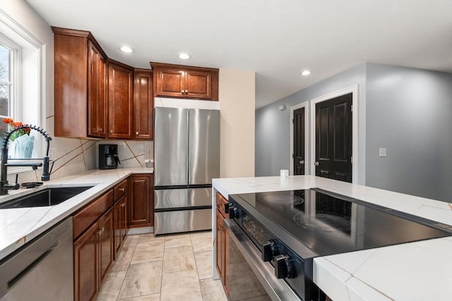 2 Britlees Way, Dudley, MA 01571 - kitchen with stainless steel appliances, recessed lighting, and decorative backsplash