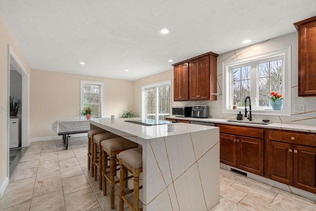 2 Britlees Way, Dudley, MA 01571 - kitchen featuring a kitchen island, recessed lighting, a kitchen bar, and dishwasher