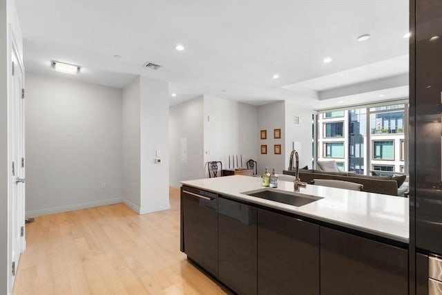 135 Seaport Blvd Unit 1901, Boston, MA 02210 - kitchen featuring light wood finished floors, open floor plan, modern cabinets, dishwashing machine, and recessed lighting