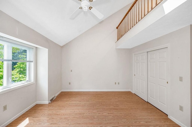 2 Steeplechase Ct Unit 2, Haverhill, MA 01832 - unfurnished bedroom featuring light wood finished floors, lofted ceiling, baseboards, a closet, and ceiling fan