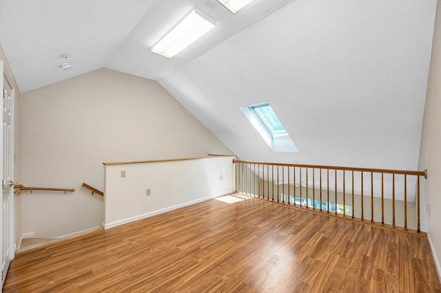 2 Steeplechase Ct Unit 2, Haverhill, MA 01832 - bonus room with a skylight, wood finished floors, lofted ceiling, and baseboards