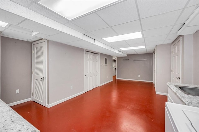 2 Steeplechase Ct Unit 2, Haverhill, MA 01832 - finished basement featuring baseboards, a drop ceiling, and a sink