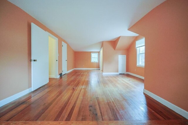 44 Huntington Ave, Sharon, MA 02067 - additional living space with light wood finished floors, lofted ceiling, and baseboards