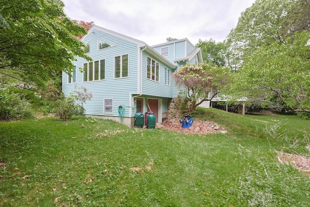 44 Huntington Ave, Sharon, MA 02067 - view of home's exterior featuring a yard