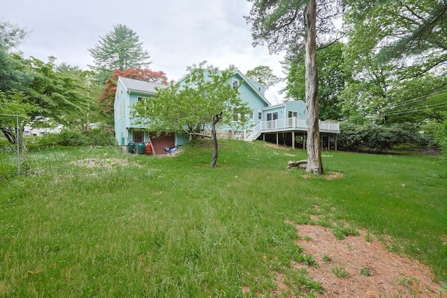 44 Huntington Ave, Sharon, MA 02067 - view of green lawn with a wooden deck and stairway