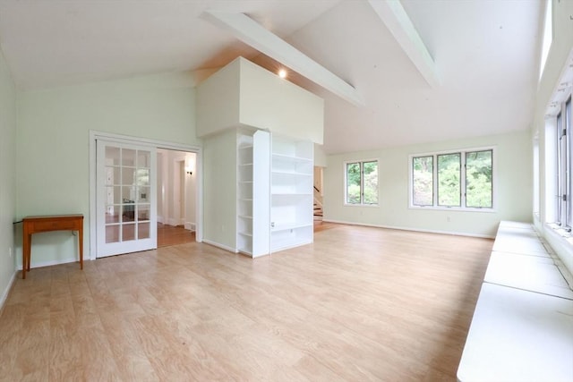 44 Huntington Ave, Sharon, MA 02067 - unfurnished living room with high vaulted ceiling, light wood-style floors, baseboards, and beam ceiling