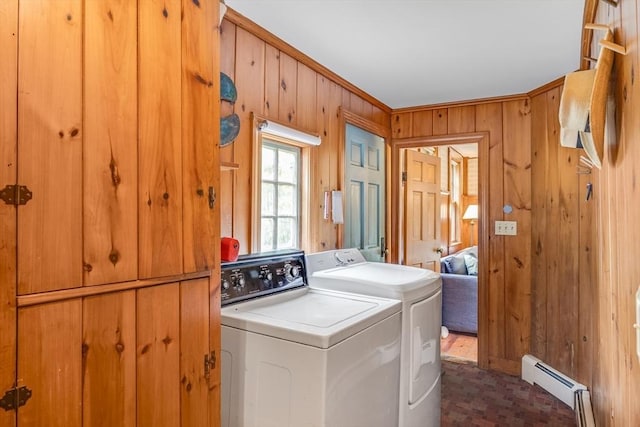 575 Nauset Rd, Eastham, MA 02642 - washroom with a baseboard heating unit, independent washer and dryer, wood walls, and ornamental molding