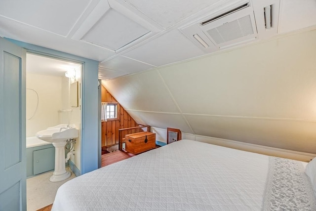 575 Nauset Rd, Eastham, MA 02642 - bedroom with ensuite bathroom and vaulted ceiling