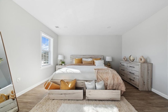 bedroom featuring hardwood / wood-style flooring