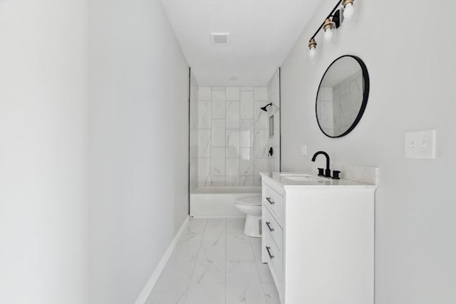 full bathroom featuring tiled shower / bath combo, vanity, and toilet