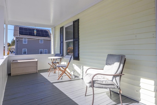 wooden terrace with covered porch