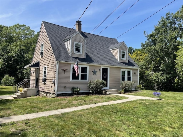 205 Blackstone St, Blackstone, MA 01504 - new england style home featuring a chimney, a front lawn, and a shingled roof