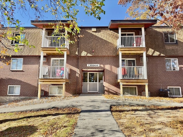 view of building exterior featuring central air condition unit