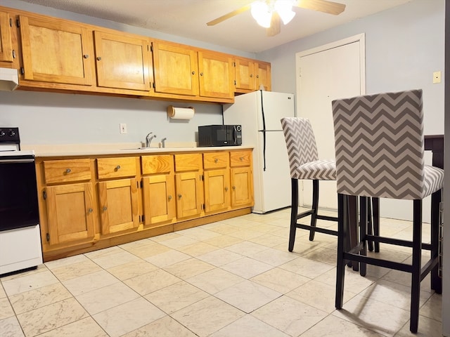 kitchen featuring white appliances, ventilation hood, ceiling fan, and sink