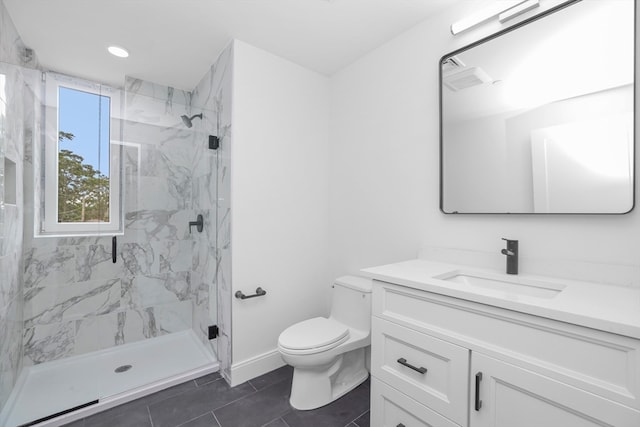 bathroom featuring vanity, toilet, tile patterned floors, and an enclosed shower