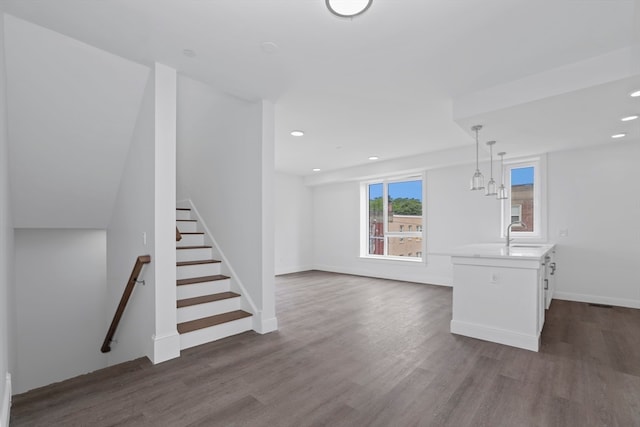 interior space with dark hardwood / wood-style floors and sink