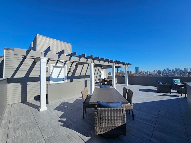 wooden terrace featuring a pergola, outdoor lounge area, and a patio area