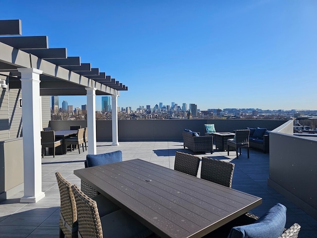 exterior space featuring a pergola, outdoor lounge area, and a patio