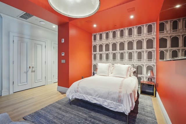 bedroom featuring light hardwood / wood-style flooring