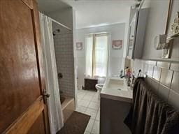 7 Kensington Rd, Worcester, MA 01602 - bathroom featuring vanity, tile patterned floors, shower / bathtub combination with curtain, and toilet