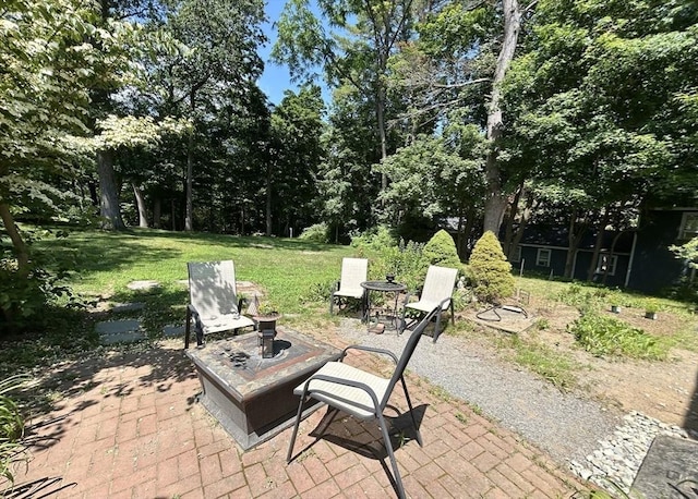53 Washington St, Topsfield, MA 01983 - view of patio featuring a fire pit