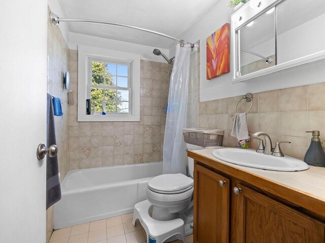 84 Lancaster Rd Unit 84, Dedham, MA 02026 - full bath with shower / tub combo, toilet, tile walls, vanity, and tile patterned flooring