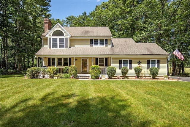 290 Mendell Rd, Rochester, MA 02770 - view of front of home featuring a chimney, covered porch, a front lawn, and a shingled roof