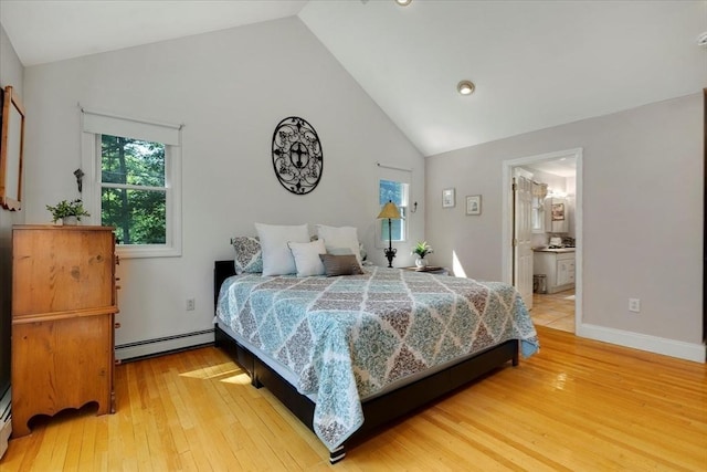 290 Mendell Rd, Rochester, MA 02770 - bedroom with a baseboard heating unit, high vaulted ceiling, light wood-style floors, and ensuite bath