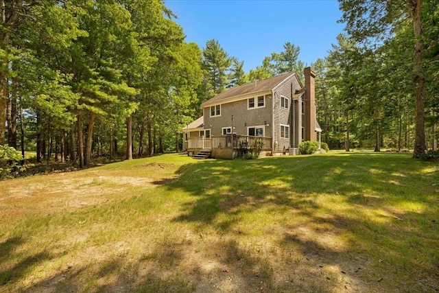 290 Mendell Rd, Rochester, MA 02770 - rear view of house featuring a chimney, a wooden deck, and a yard