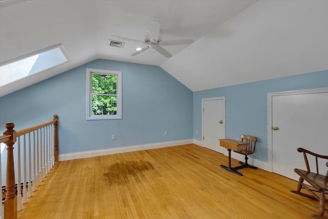 290 Mendell Rd, Rochester, MA 02770 - additional living space featuring a skylight, a ceiling fan, light wood-style flooring, and vaulted ceiling